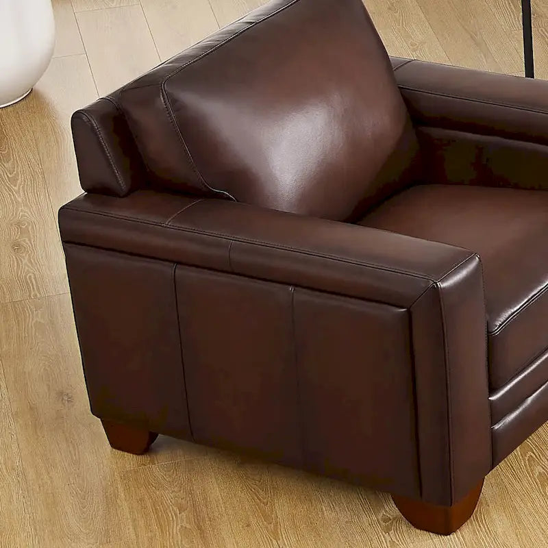 Fauteuil en cuir pleine fleur avec coussins en plumes d'oie et ressorts ensachés