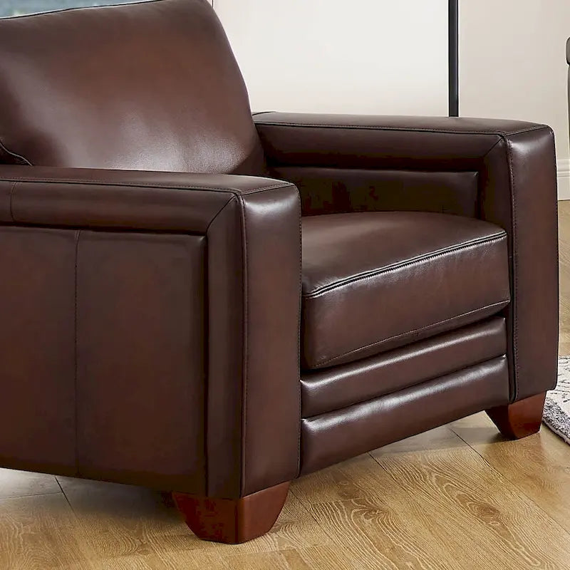 Fauteuil en cuir pleine fleur avec coussins en plumes d'oie et ressorts ensachés
