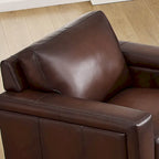 Fauteuil en cuir pleine fleur avec coussins en plumes d'oie et ressorts ensachés