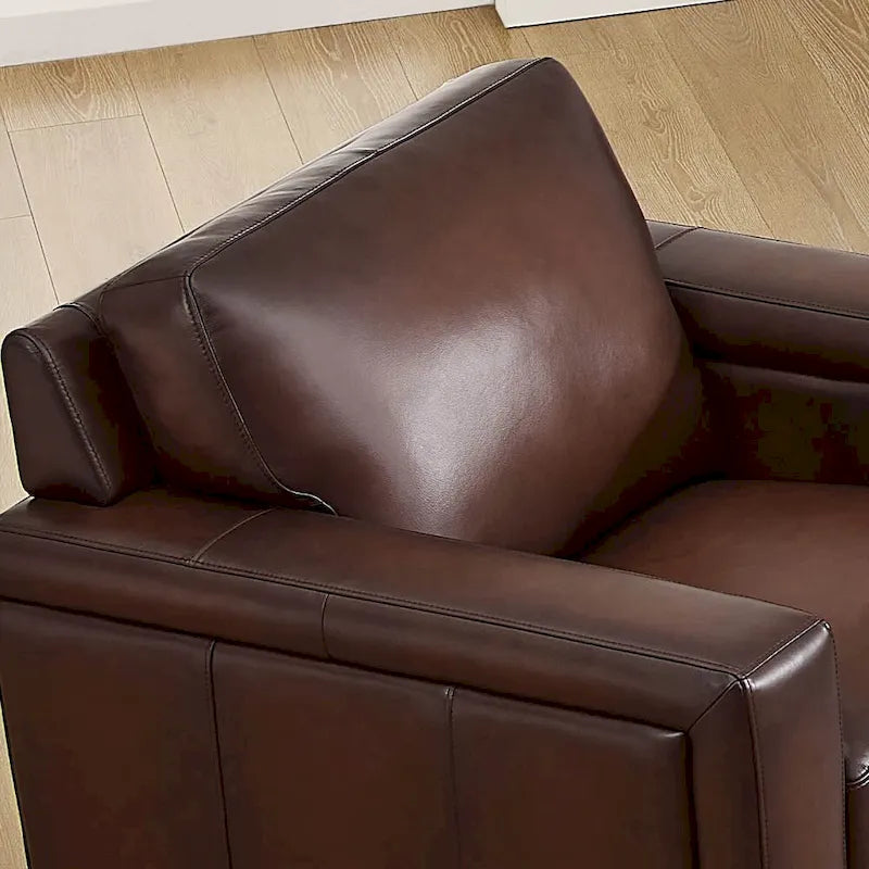 Fauteuil en cuir pleine fleur avec coussins en plumes d'oie et ressorts ensachés